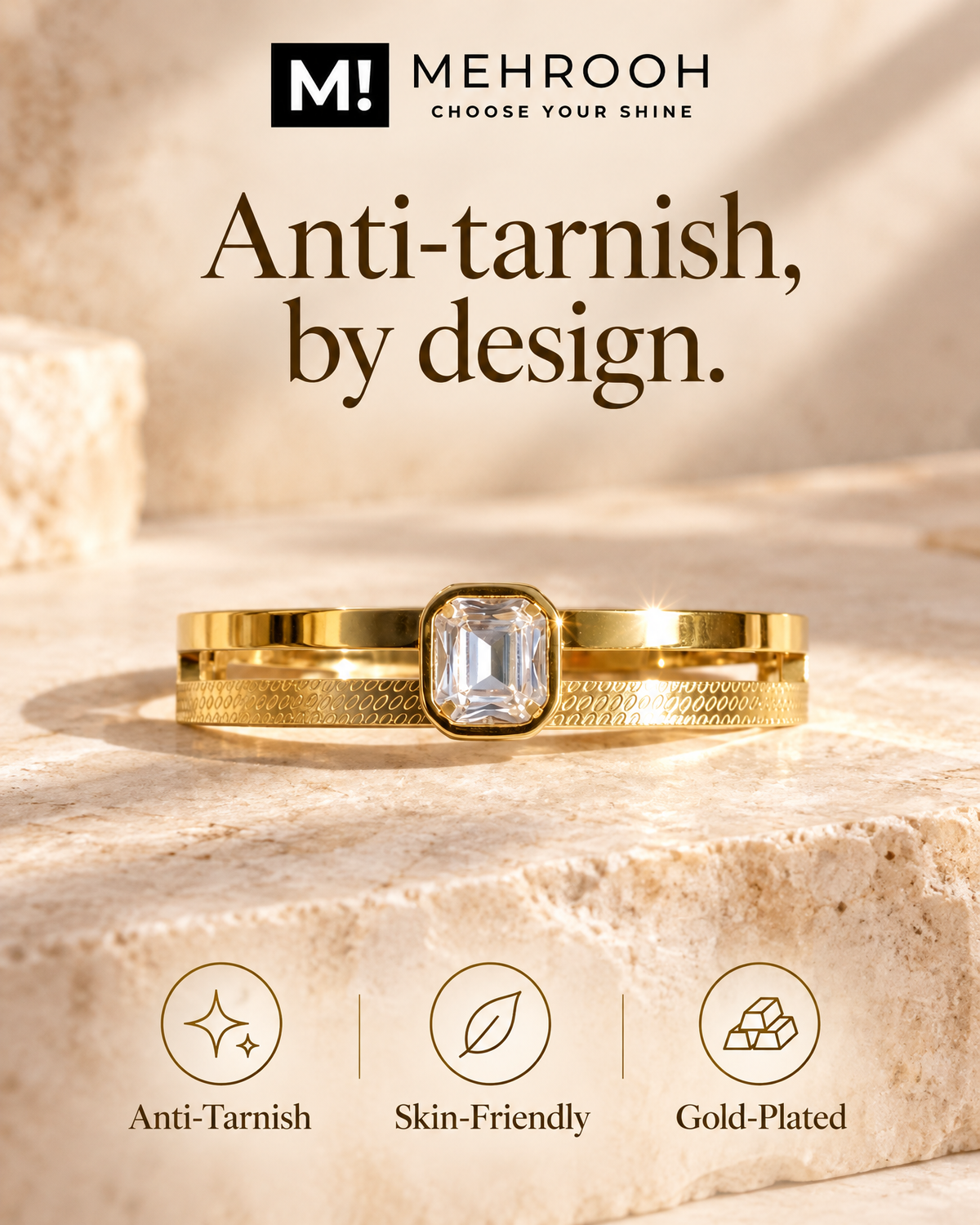 A gold-plated ring with a rectangular clear gemstone is displayed on a beige stone surface. The image features the brand logo 'MEHROOH' at the top and three feature icons at the bottom highlighting 'Anti-Tarnish', 'Skin-Friendly', and 'Gold-Plated'.