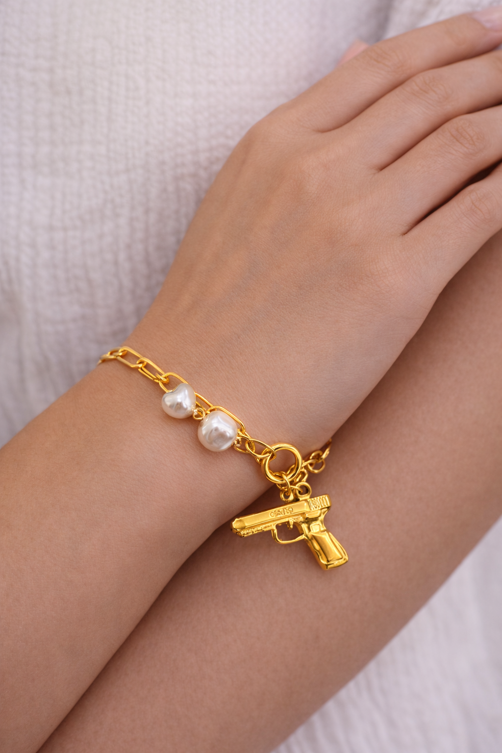 Pearl Link Statement Bracelet with Gun Charm