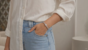 genz girl wearing celestial halo braclet